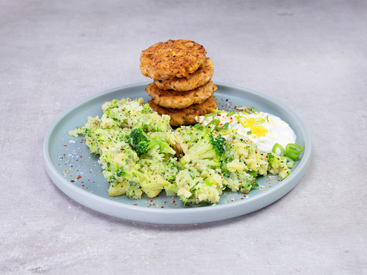 Savor the delicious and healthy chicken and bean patties with a side of potato and broccoli mash. Enjoy a satisfying meal!
